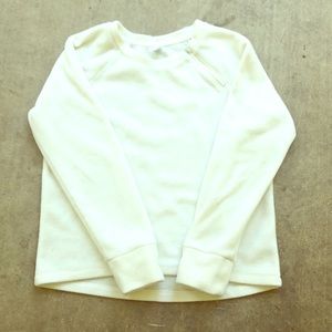 A soft white sweater